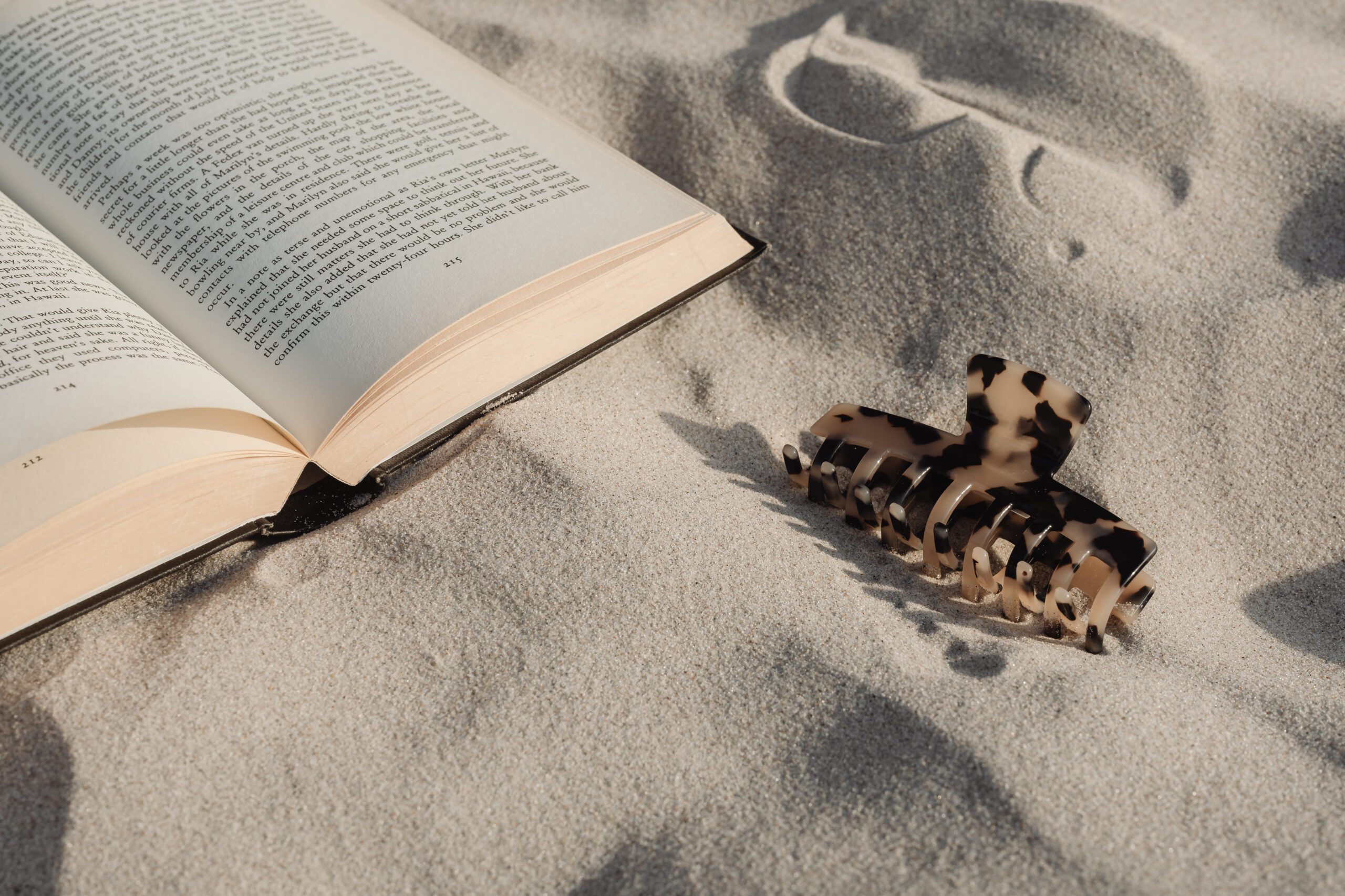 Teens hairclip and book while receiving teen therapy in the woodlands